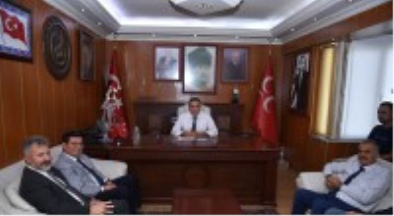 Tütüncü’den MHP’ye “hayırlı olsun” ziyareti