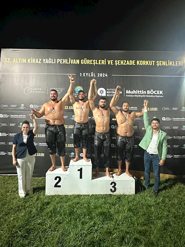 Kemer Belediyesi güreşçileri kürsüye çıktı